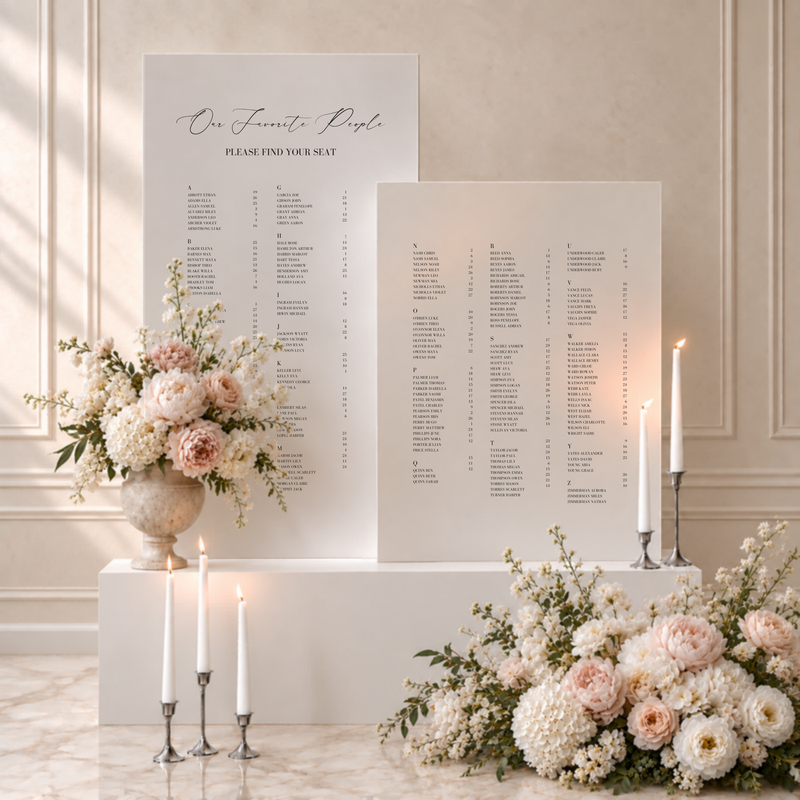 Aria collection acrylic double wedding seating chart, two white panels listing guest names alphabetically with table numbers