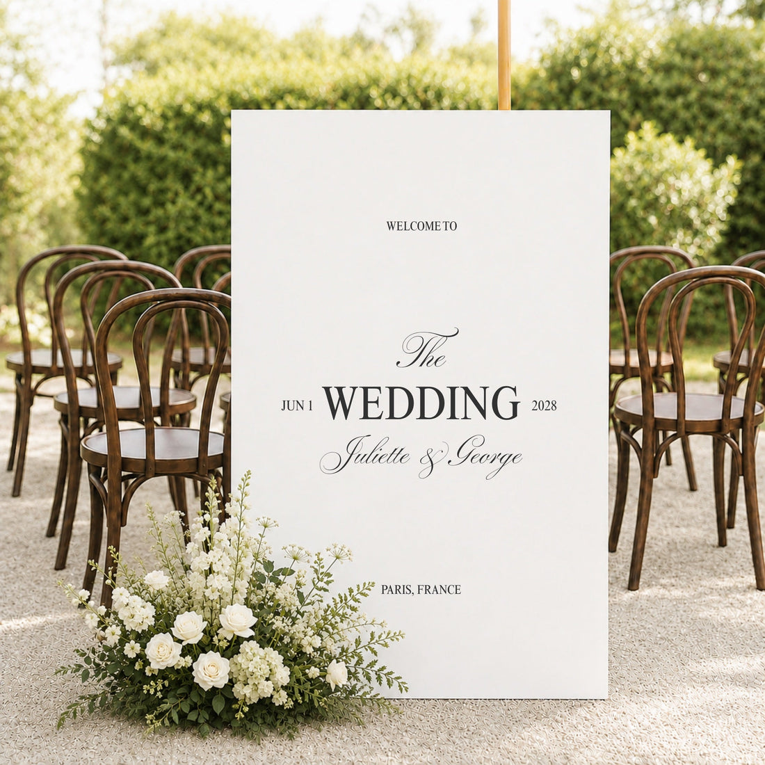 Juliette printable wedding welcome sign template on an easel at an outdoor ceremony