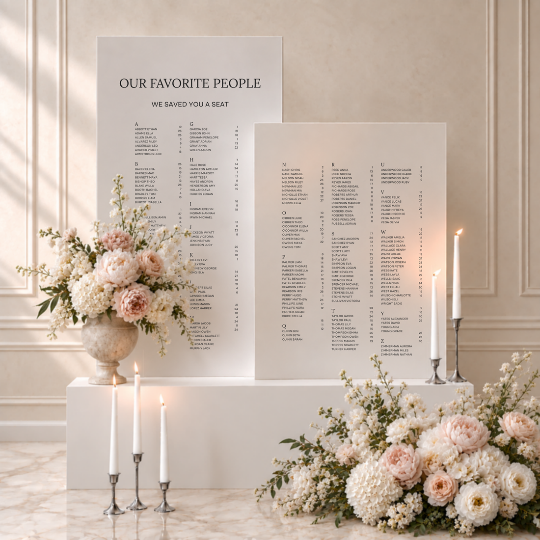 Moda collection acrylic double wedding seating chart, two white panels listing guest names alphabetically with table numbers